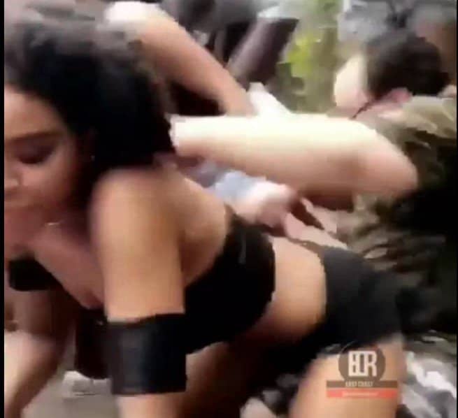 Woman twerks man to ground.